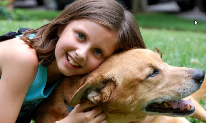 Your kid with her first dog